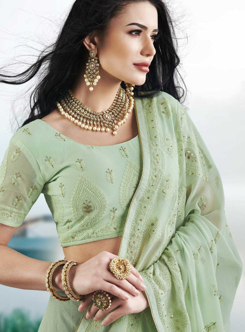 Light green coloured Georgette Saree with Lakhnavi Work Border